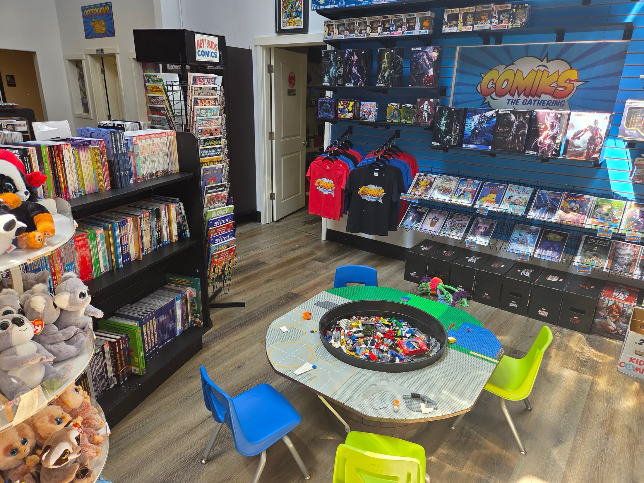 Collectibles corner and character displays at Comiks The Gathering